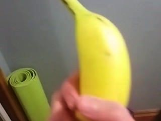 青少年fondles香蕉